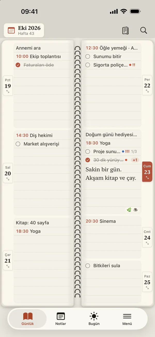 Paperweek hafta görünümü: spiral ciltli defterin karşılıklı iki sayfasında her günün görevleri, etkinlikleri ve notları